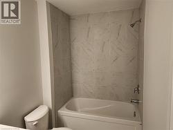 Full bathroom featuring washtub / shower combination - 
