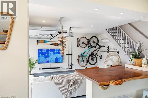 Bar featuring wooden counters, stairs, and recessed lighting - 197 Cedar Drive, Turkey Point, ON - Indoor Photo Showing Other Room