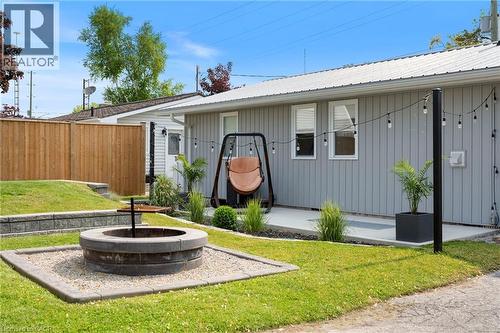 Property entrance featuring a metal roof - 197 Cedar Drive, Turkey Point, ON - Outdoor