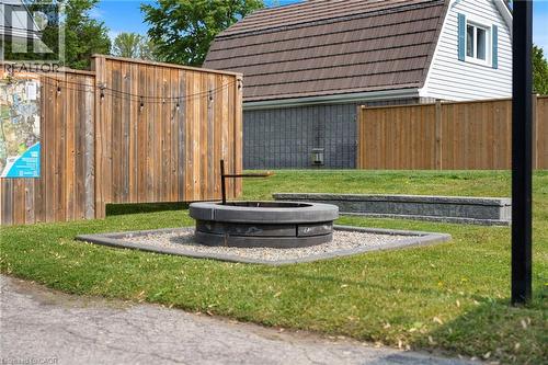 View of yard featuring a fire pit - 197 Cedar Drive, Turkey Point, ON - Outdoor