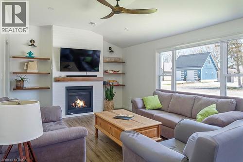 197 Cedar Drive, Turkey Point, ON - Indoor Photo Showing Living Room With Fireplace