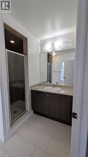 Full bath featuring vanity, a stall shower, and light tile patterned flooring - 19 Cromarty Avenue, Caledonia, ON - Indoor Photo Showing Bathroom