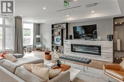 457 Plains Road E Unit# 302, Burlington, ON - Indoor Photo Showing Living Room With Fireplace