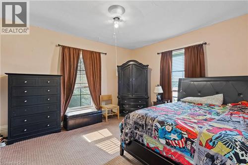 Bedroom with carpet floors - 5368 Menzie Street, Niagara Falls, ON - Indoor Photo Showing Bedroom
