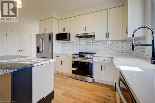 117 Thackeray Way, Harriston, ON - Indoor Photo Showing Kitchen With Upgraded Kitchen