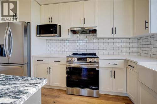 117 Thackeray Way, Harriston, ON - Indoor Photo Showing Kitchen With Upgraded Kitchen