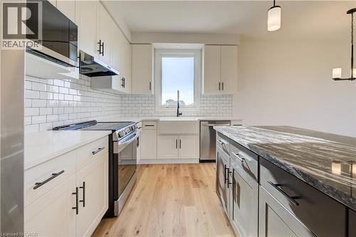 117 Thackeray Way, Harriston, ON - Indoor Photo Showing Kitchen With Upgraded Kitchen