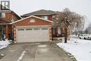 View of front facade with an attached garage, brick siding, and driveway - 3 Jacqueline Boulevard, Hamilton, ON  - Outdoor 