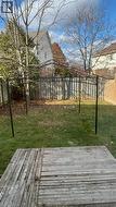 Deck featuring a fenced backyard - 