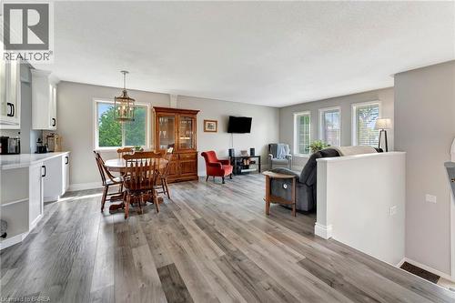 Dining room with light wood-style floors and baseboards - 1565 Old Brock Street, Vittoria, ON - Indoor