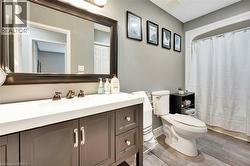 Bathroom featuring vanity and light wood-type flooring - 