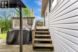 Wooden deck featuring grilling area - 