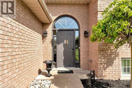 View of exterior entry featuring brick siding - 1565 Old Brock Street, Vittoria, ON - Outdoor With Exterior