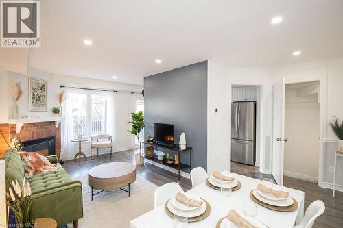 2350 Grand Ravine Drive Unit# 12, Oakville, ON - Indoor Photo Showing Living Room With Fireplace