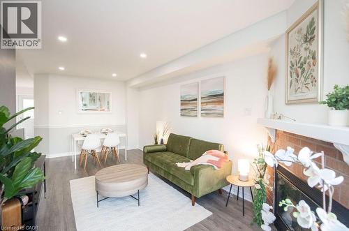 2350 Grand Ravine Drive Unit# 12, Oakville, ON - Indoor Photo Showing Living Room With Fireplace