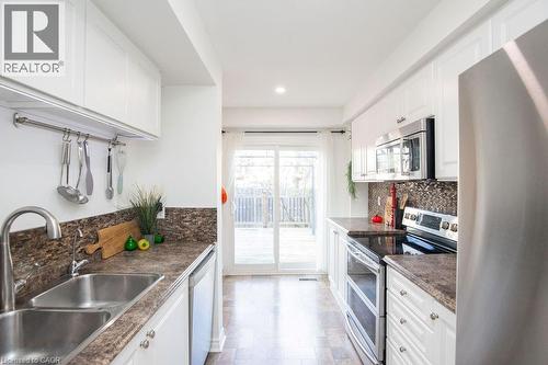 2350 Grand Ravine Drive Unit# 12, Oakville, ON - Indoor Photo Showing Kitchen With Double Sink