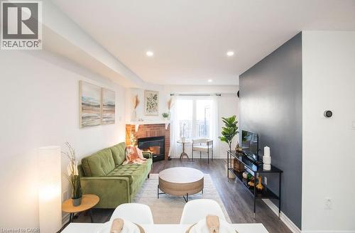 2350 Grand Ravine Drive Unit# 12, Oakville, ON - Indoor Photo Showing Living Room With Fireplace