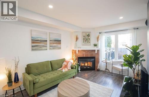 2350 Grand Ravine Drive Unit# 12, Oakville, ON - Indoor Photo Showing Living Room With Fireplace