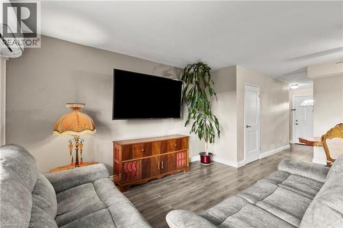 Family room with AC - 350 Quigley Road Unit# 512, Hamilton, ON - Indoor Photo Showing Living Room