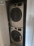 Laundry area featuring stacked Washer /Dryer - 