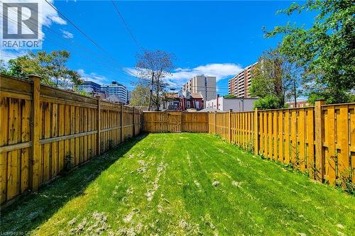 View of fenced backyard - 51 West Avenue N, Hamilton, ON - Outdoor