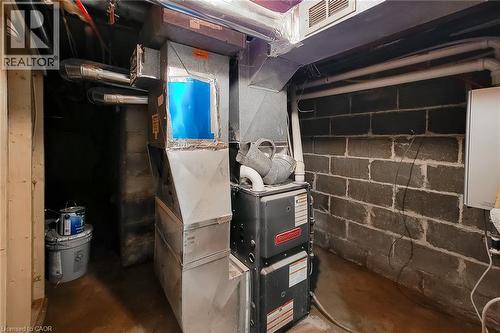 Utility room with heating unit - 51 West Avenue N, Hamilton, ON - Indoor