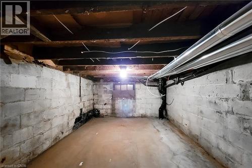 View of unfinished below grade area - 51 West Avenue N, Hamilton, ON - Indoor Photo Showing Basement