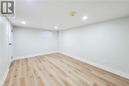 Below grade area with recessed lighting and light wood-style floors - 51 West Avenue N, Hamilton, ON - Indoor