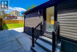 Property entrance featuring a patio - 