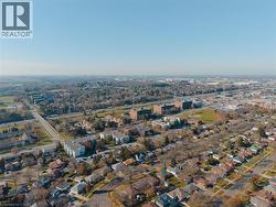 Aerial overview of property's location featuring nearby suburban area - 