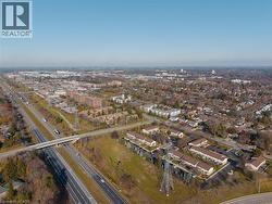 Aerial view of property's location with nearby urban area - 