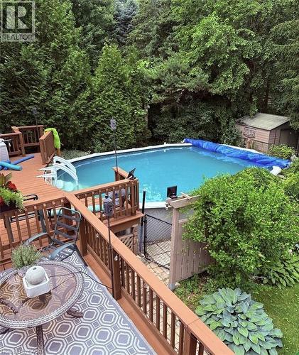 1962 Snake Road, Burlington, ON - Outdoor With Above Ground Pool With Backyard