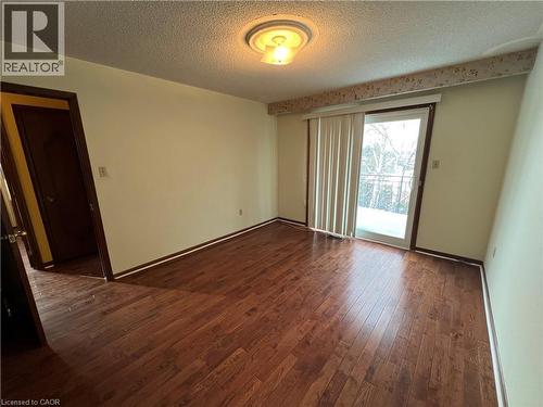 Hardwood floors and balcony - 185 Lavina Crescent, Hamilton, ON - Indoor Photo Showing Other Room