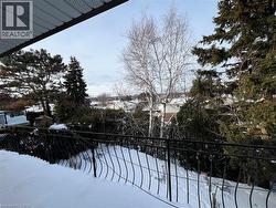 View of yard from primary bedroom balcony - 
