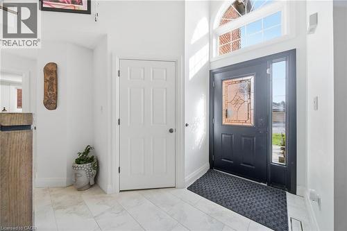 Entryway with a high ceiling and baseboards - 136 Braemar Avenue, Caledonia, ON - Indoor Photo Showing Other Room