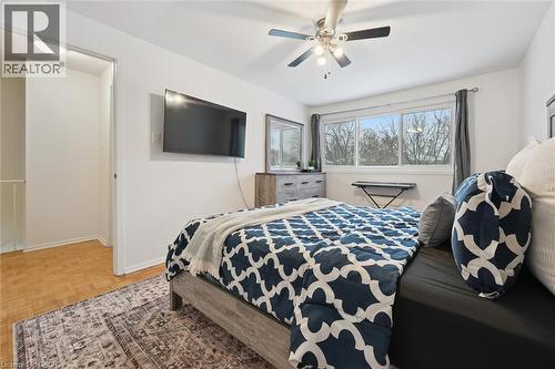 Bedroom featuring a ceiling fan and an AC wall unit - 11 Ingleside Drive, Kitchener, ON - Indoor Photo Showing Bedroom
