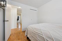 Bedroom featuring a closet and baseboards - 