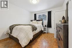 Bedroom featuring baseboards - 