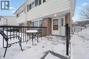 Snow covered patio with a storage shed - 11 Ingleside Drive, Kitchener, ON  - Outdoor With Exterior 