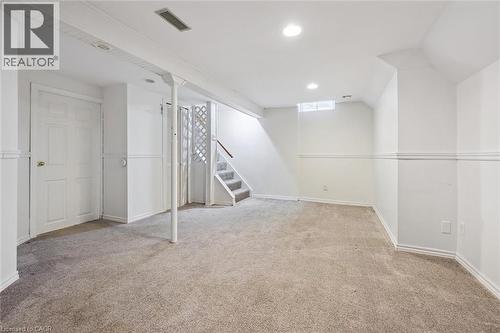 Finished basement with stairs, light carpet, and recessed lighting - 11 Ingleside Drive, Kitchener, ON - Indoor Photo Showing Other Room