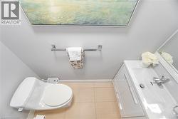 Half bathroom featuring toilet - 