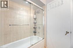 Bathroom with enclosed tub / shower combo - 