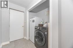 Washroom featuring washer / clothes dryer and laundry area - 