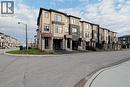 View of property featuring a residential view - 155 Equestrian Way Unit# 114, Cambridge, ON  - Outdoor With Facade 