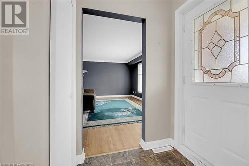 Foyer with baseboards and dark wood-style floors - 9 Gavin Drive, St. Catharines, ON - Indoor Photo Showing Other Room