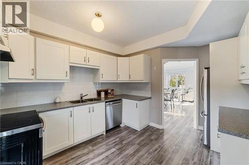 Newer stainless appliances - 4199 Longmoor Drive Unit# 6, Burlington, ON - Indoor Photo Showing Kitchen With Double Sink