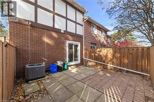Fenced backyard featuring a patio area - 4199 Longmoor Drive Unit# 6, Burlington, ON - Outdoor With Exterior