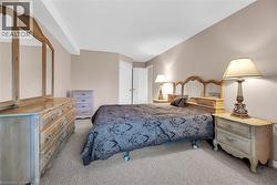 Bedroom with light carpet - 