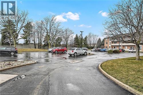 View of uncovered parking lot - 416 Limeridge Road E Unit# 309, Hamilton, ON - Outdoor