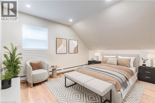 Staged Primary Bed Upper unit - 152 Sanford Avenue S, Hamilton, ON - Indoor Photo Showing Bedroom